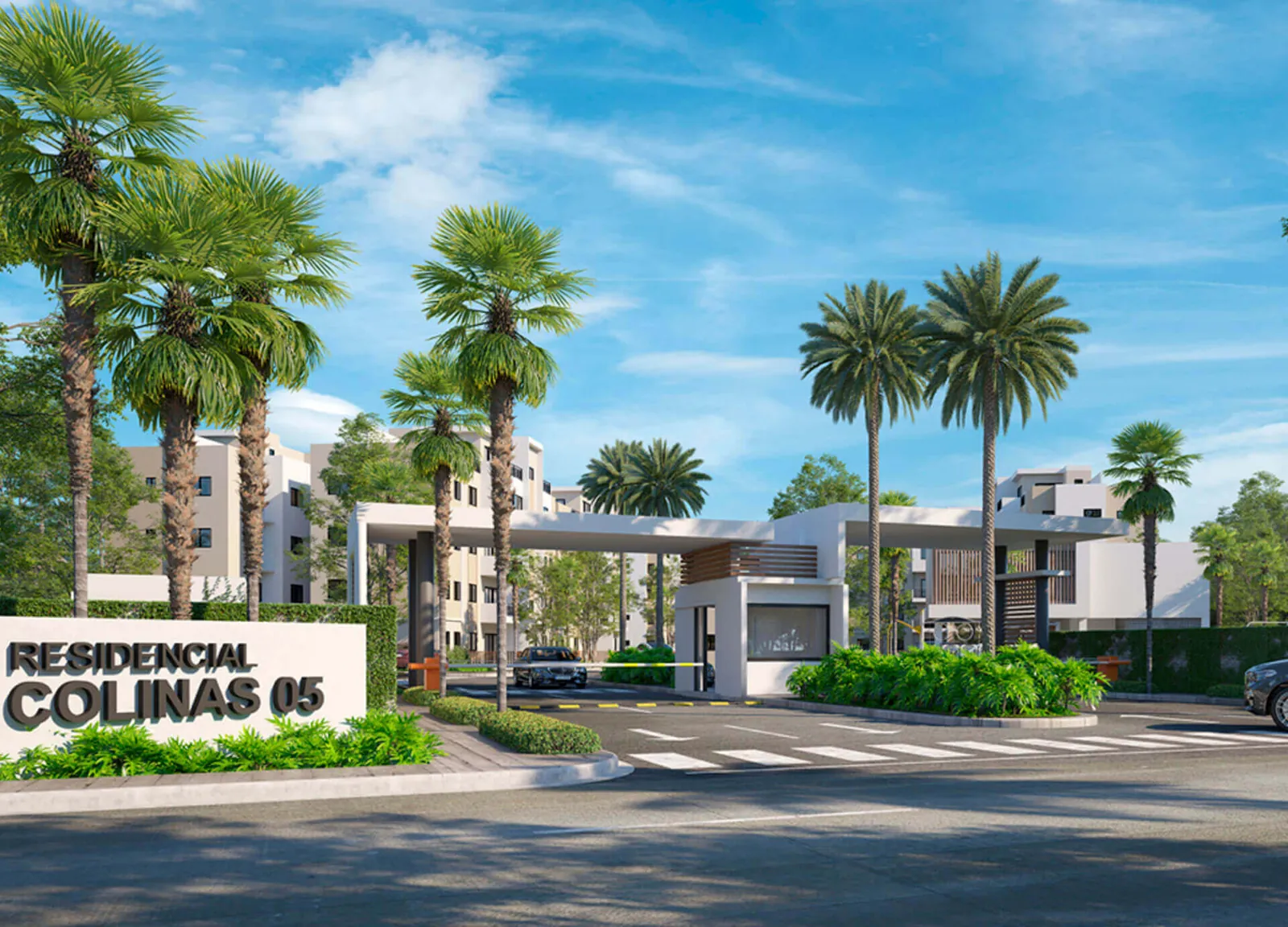 Acceso principal del Residencial Colinas 05 con palmeras