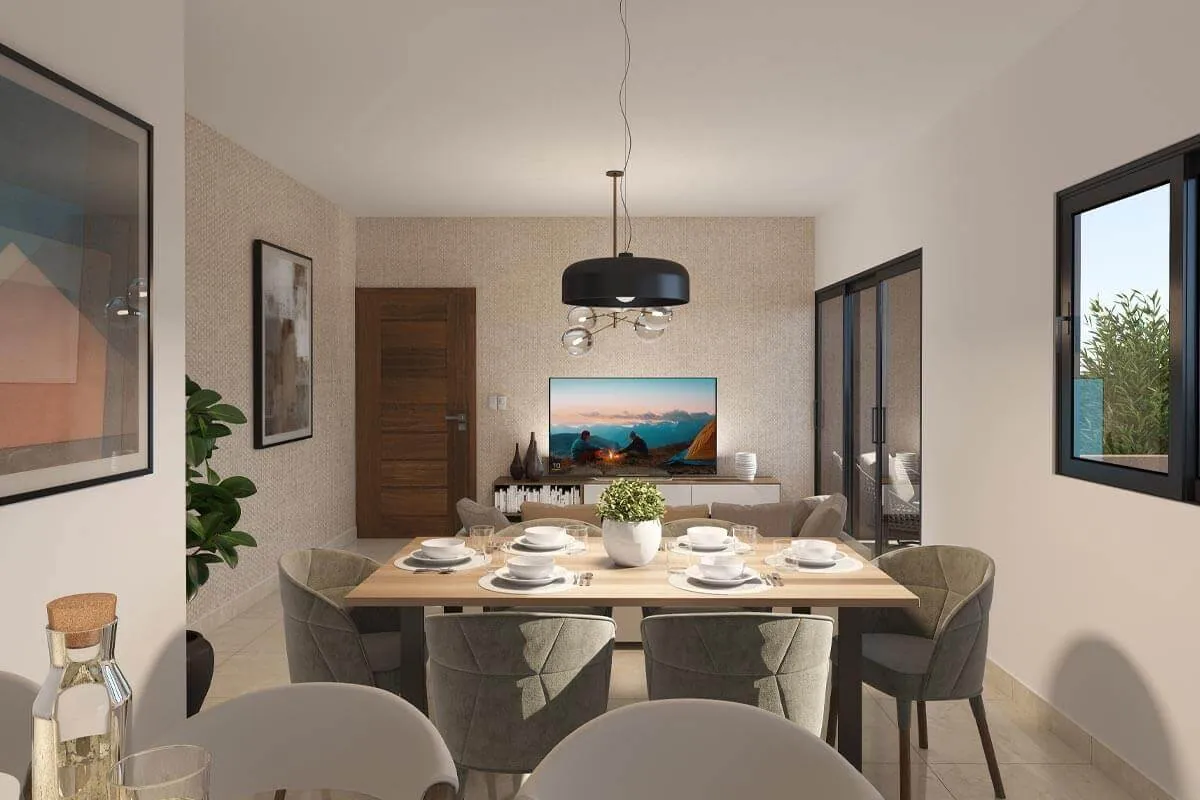 Comedor de un apartamento de Brisas de las Colinas 4 con lámpara colgante