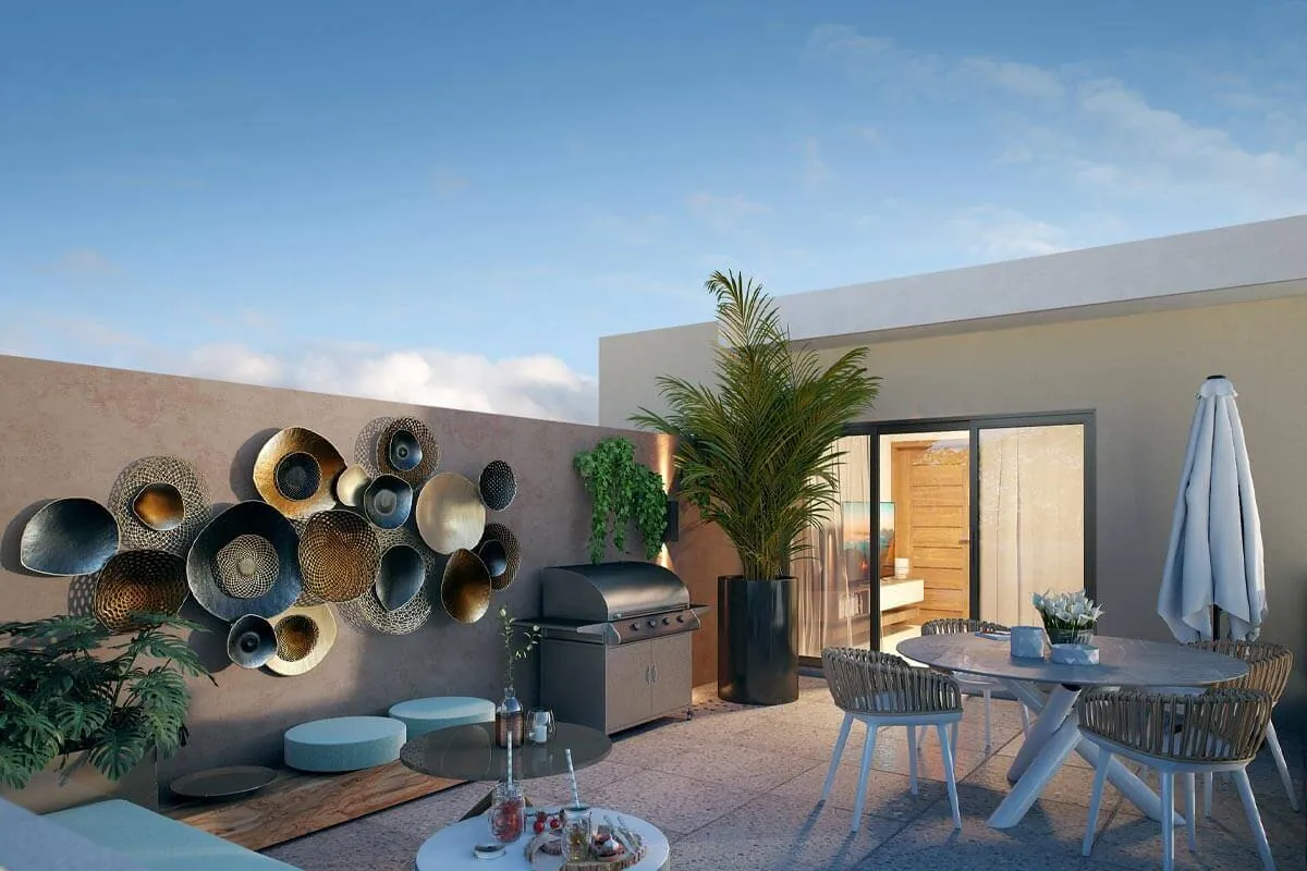 Terraza en el techo con comedor, parrilla y plantas